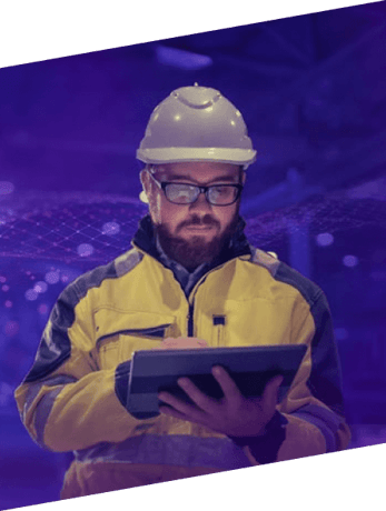 construction worker holding tablet